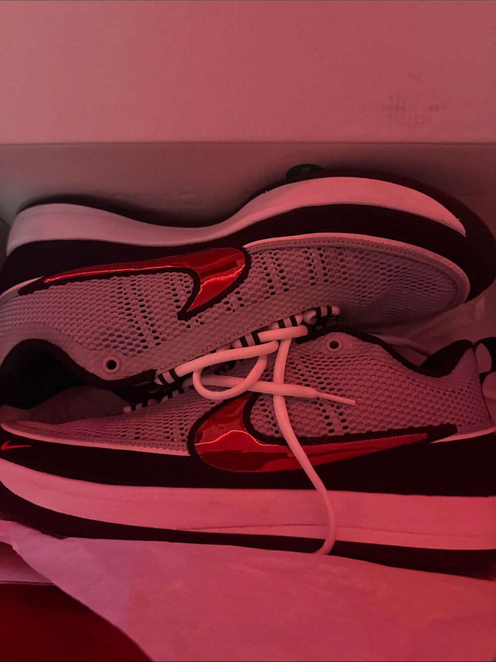 Nike Women's White Mesh Sneakers with Shiny Red Swoosh